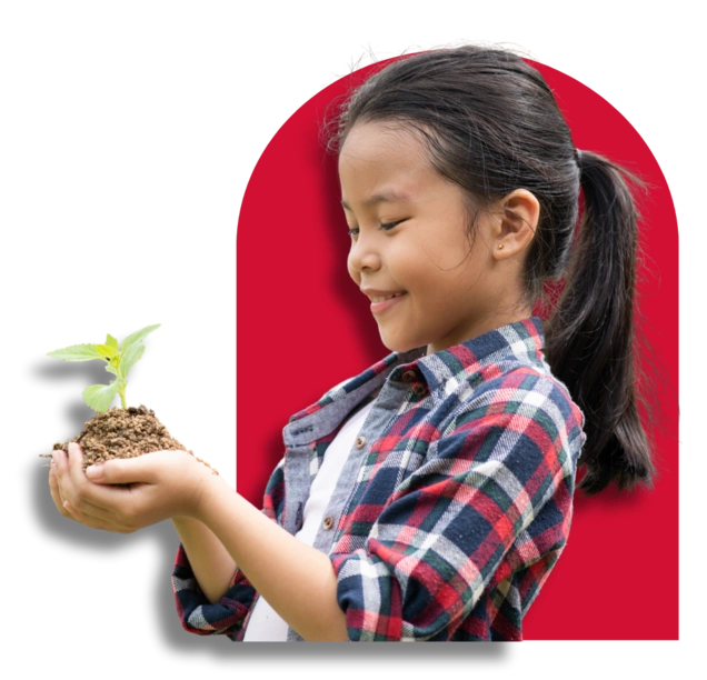 Girl holding a plant seedling